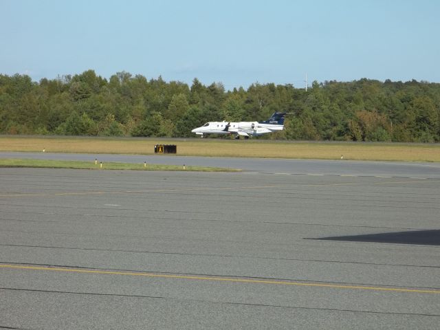 Learjet 31 (N47TR) - Landing after test flight  after maintainance at Spitfire Aviation Concord, N.C