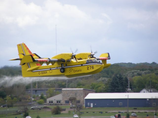 Canadair CL-415 SuperScooper (C-GOGX) - CL415 demo St. Marys river.