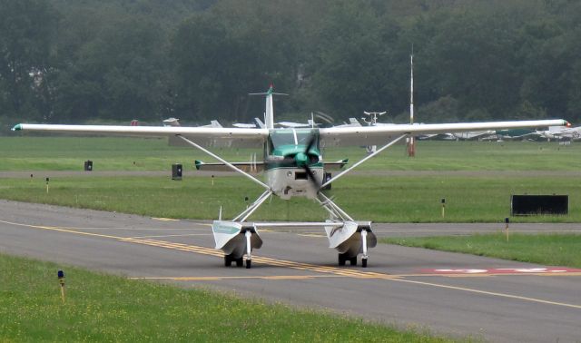 Cessna Skywagon (N97FA) - On taxiway A on the way for take off runway 26. Aircraft is based at RELIANT AIR. They have the lowest fuel price on the Danbury (KDXR) airport.