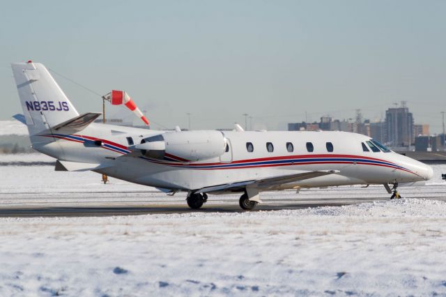 Cessna Citation Excel/XLS (N835JS) - Citation Excel on a snowy Toronto afternoon