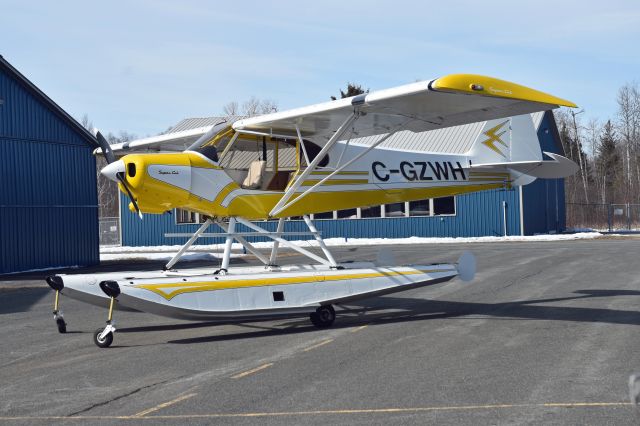 Piper L-21 Super Cub (C-GZWH) - 2003 Piper PA-18 Lazure Cub (C-GZWH/1098) sitting outside of its hangar on March 9, 2021