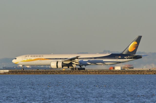 BOEING 777-300ER (VT-JEF) - Landing--reverse thrust at SFO after completing a Mumbai-Bangkok-San Francisco trip.