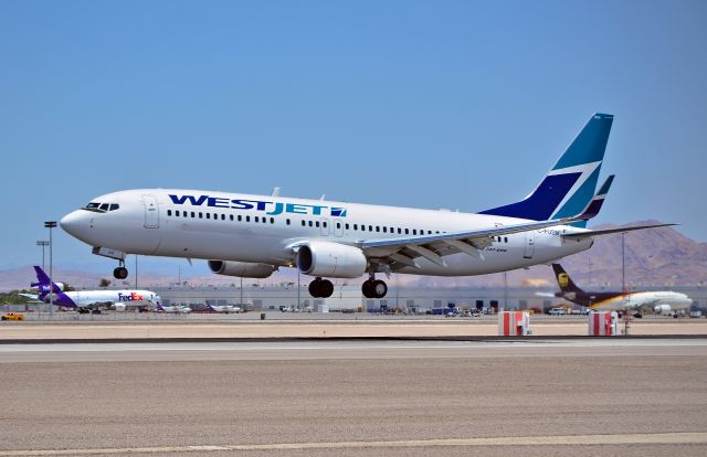 Boeing 737-800 (C-FUSM) - C-FUSM Westjet 2013 Boeing 737-8CT - cn 39081 / ln 4702 - McCarran International Airport (KLAS)br /Las Vegas, Nevadabr /TDelCorobr /June 14, 2014