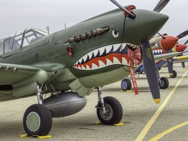 CURTISS Warhawk (N40245) - L to R. N40245 Yank's Air Museum P-40E Warhawk, N94466 Warhawk Air Museum P-40E Kittyhawk, N85104 Planes of Fame P-40N. May 05  2019 Planes of Fame Airshow.