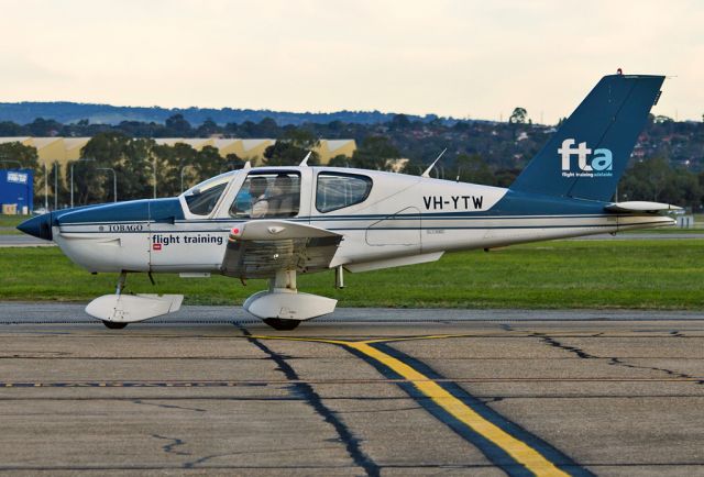 Socata Tobago (VH-YTW) - FLIGHT TRAINING ADELAIDE - SOCATA TB-10 TOBAGO - REG VH-YTW (CN 1605) - PARAFIELD AIRPORT ADELAIDE SA. AUSTRALIA - YPPF (12/6/2016) CAPTURE WITH A CANON EOS 550D AND A CANON 300MM FIXED LENS.