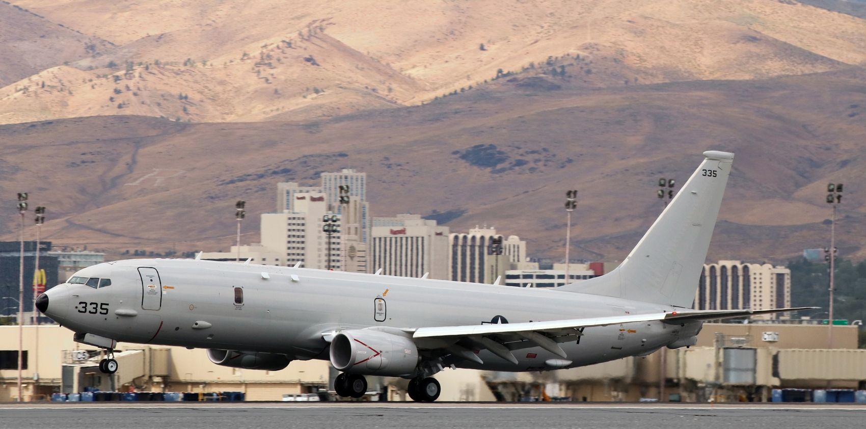 Boeing P-8 Poseidon (16-9335) - Touching down on 16R for a brief visit.