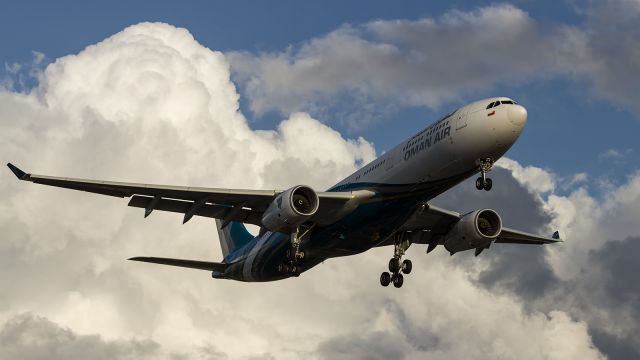 Airbus A330-300 — - OMAN Air, A333, approaching runway 027R at LHR.