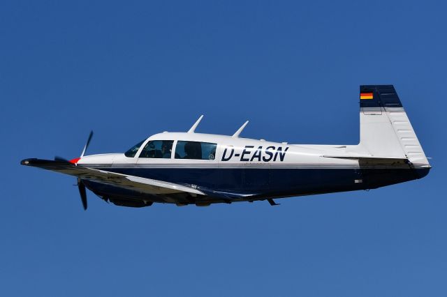 Mooney M-20 (D-EASN) - Take-off between the dunes. 06-13-21.br /Mooney M-20J 201br /Owner: Fliegerclub Merzbrück e.V. (FCM) 