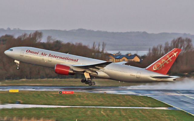 Boeing 777 (N918AX) - omni b-777 n918ax dep shannon 22/12/13.