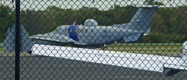 Beechcraft Super King Air 350 (N561A) - MORRISTOWN, NEW JERSEY, USA-OCTOBER 01, 2020: Seen on the other side of the security fence, shortly after the arrival of President Trump on Air Force One for a very short campaign stop at his golf club in nearby Bedminster, was this Beechcraft Super King Air 350 belonging to the U.S. Department of Homeland Security-Customs and Border Protection. With Air Force One parked approximately 100 yards away and the area teaming with federal and local law enforcement, the idea of walking up to the fence and sticking my camera through for a better picture was not an option.