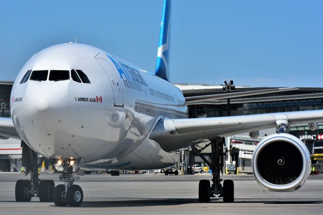 Airbus A330-200 (C-GUBF) - Air Transat Airbus A330-243 taxiing out for departure at YYC on Aug 3.