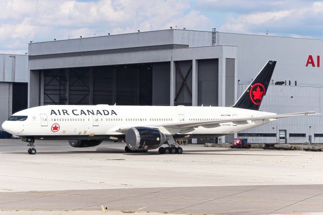 BOEING 777-200LR (C-FNND) - The impact COVID-19 had on the aviation industry visualized. Air Canada's B77L sits on the apron, all covered up for long-term storage, not knowing what to expect next.