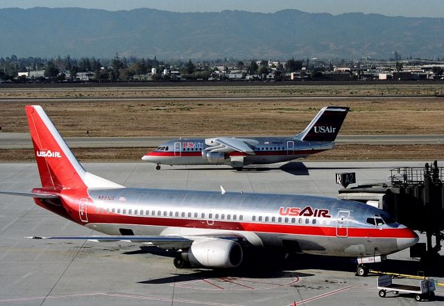 BOEING 737-300 (N591US) - KSJC - Boeing 737-300 (cn:23936/1575) at San Jose gate A2 in early 1990s.