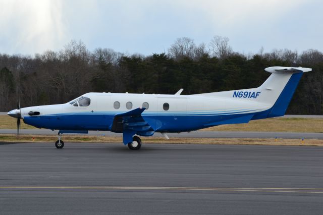 Pilatus PC-12 (N691AF) - PEOPLES UNITED BANK NA (Plane Sense) arriving just before a snow quall passed over the airport at KJQF - 1/16/21