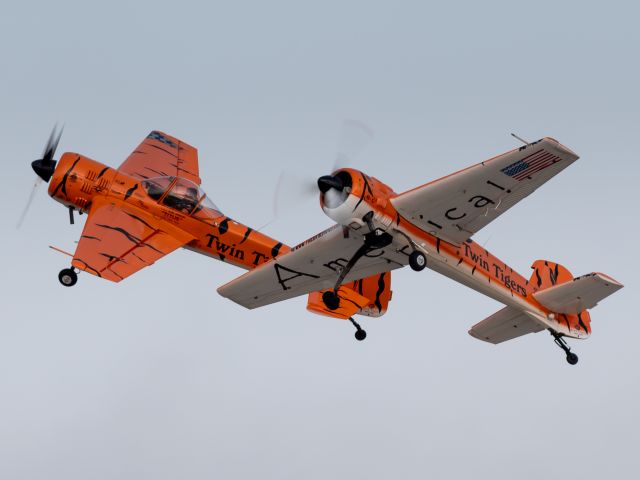 YAKOVLEV Yak-55 (N922GR) - The Flying Tigers performing at EAA Airventure 2019. RIP Mark Nowosielski in the closer of the two aircraft.