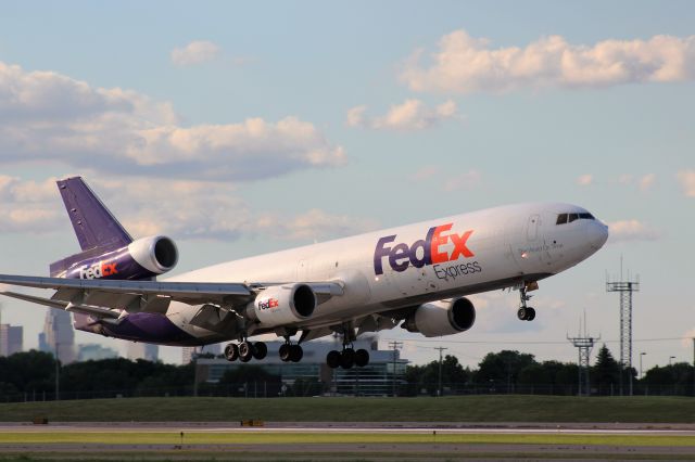 Boeing MD-11 (N572FE) - Landing in front of Aviation-Fan Friendly Observation area at MSP Airport.