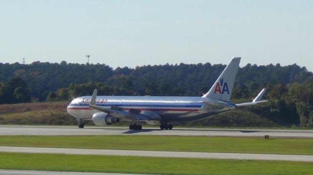 BOEING 767-300 (N352AA) - Landing runway 23R.