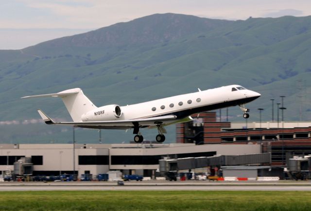 Canadair Challenger (N18RF) - KSJC - 2001 Gulfstream Aerospace G-V C/N 628 lifting off 12R at San Jose March 27th, 2005.