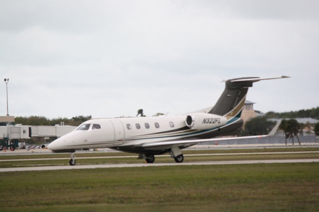 Embraer Phenom 300 (N322FL) - Flight Options Flight 322 (N322FL) arrives at Sarasota-Bradenton International Airport