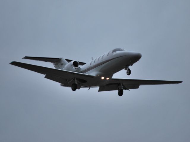 Cessna Citation CJ1 (N307BS) - JT AIR LLC on final for runway 2 at KJQF - 11/15/12