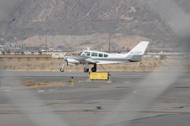 Cessna Executive Skyknight (N13BP) - Man its loud with those props.... Gunning up for that wild blue yonder, My first photo at KSPK after it was U77