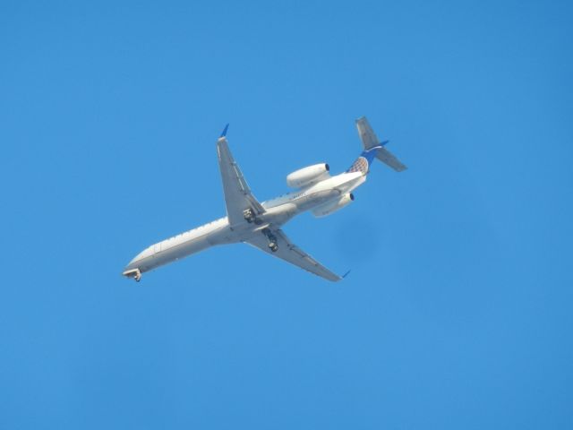 Embraer ERJ-145 (NJ14171) - A United Airlines Embraer E-145 Flies By With Gear Down While Approaching Dulles International