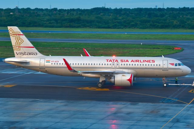 Airbus A320 (VT-ATV) - Retrojet beauty set for departure from RGIA by dawn’s early light.