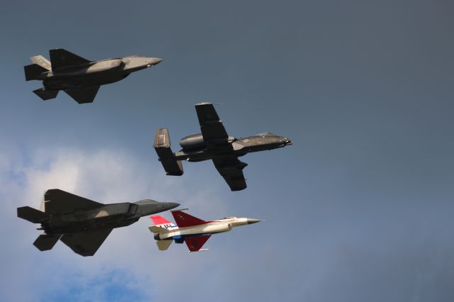 Lockheed F-22 Raptor (AFR1018) - Beautiful USAF Heritage Flight highlighting planes of the current air arsenal / F-22, F-35, A-10 and the red white & blue F-16 Demo Jet from Shaw AFB SC. br /Wednesday July 24 Oshkosh.