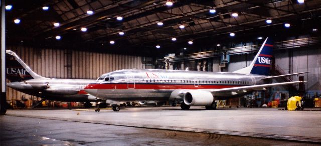 BOEING 737-300 (N385US) - Midnight shift at the hangar in BOS