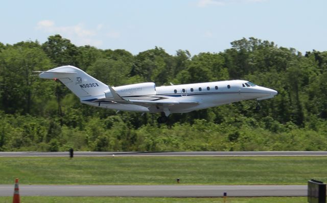 Cessna Citation Sovereign (N503CX) - A Cessna C680 Sovereign X departing Runway 22 at Boswell Field, Talladega Municipal Airport - May 6, 2017. Uploaded with the permission of Textron Aviation. I shot this with the 18-55mm lens from across the ramp and taxiway, and without the circular polarizer attached. It definitely would've looked better through the 75-300mm lens.