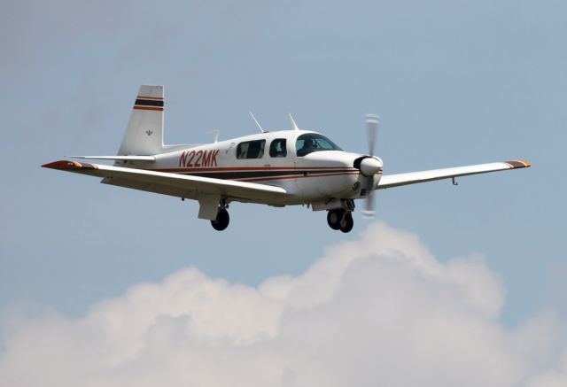 Mooney M-20 (N22MK) - Landing on RW26 at KDXR. RELIANT AIR has the lowest fuel price on the Danbury (KDXR)airport.