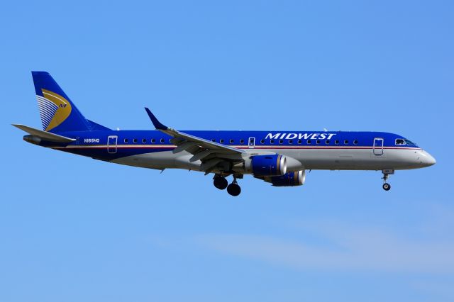 Embraer ERJ-190 (N165HQ) - Midwest - N165HQ - E190 - Arriving KDFW 02/21/2014 - This is a rare sight...This may actually be the ONLY Midwest frame left...