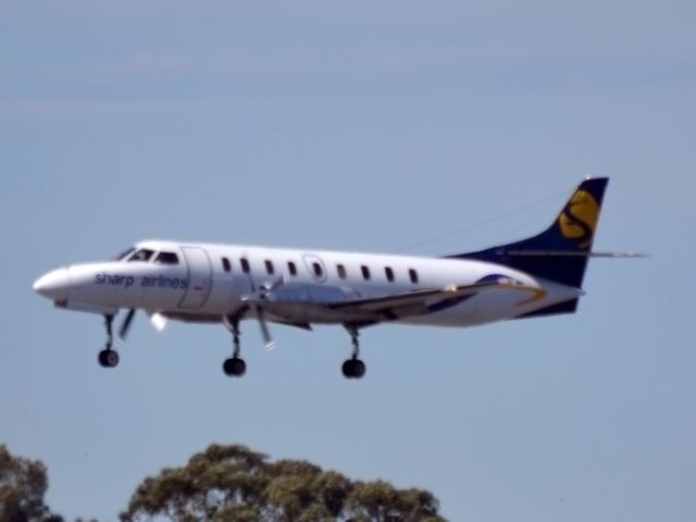 VH-UUB — - Crossing the threshold on runway 05.