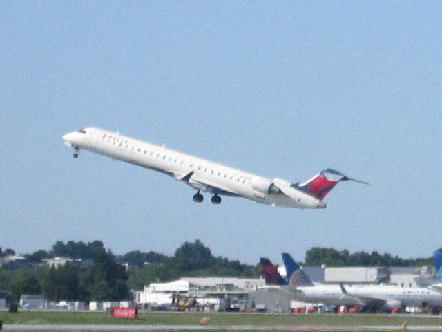 Canadair Regional Jet CRJ-900 (N904XJ) - Taken from the VTaNG Fire Station.