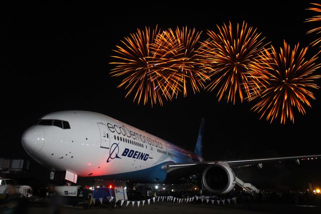 Boeing 777-200 (N861BC) - Wednesday Night Show at AirVenture 7-27-2022.br /The Boeing Ecodemonstrator made for a nice foreground subject.br /Handheld Canon Rebel T6i using 2 sec. shudder delay and 1/5" sec. exposure. ISO 800 No tripod today.