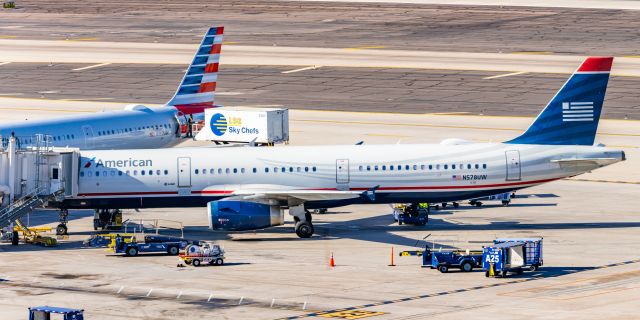 Airbus A321 (N578UW) - An American Airlines A321 in US Airways retro livery parked at PHX on 2/4/23. Taken with a Canon R7 and Tamron 70-200 G2 lens.