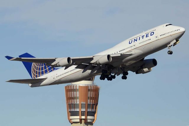 Boeing 747-400 (N128UA) - United Boeing 747-422 N128UA departing from Sky Harobor with an Ohio State football charter bound for Rickenbacker International Airport on January 2, 2016. It first flew on May 1, 2000. It carries construction number 30023. It was delivered to United on May 12, 2000. 