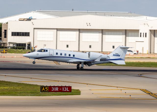 Learjet 60 (N69RK) - Lear Jet 60 landing in DAL.