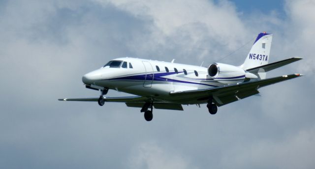 Cessna Citation Excel/XLS (N543TA) - On short final is this 2003 Cessna 560XL Citation Excel in the Summer of 2023.