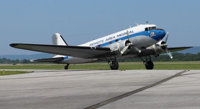 Douglas DC-3 (N982Z) - A 1942 model Douglas DC-3C (originally constructed as a C-47A-20-DK, construction number 12947) taxiing onto the ramp at Northeast Alabama Regional Airport, Gadsden, AL - June 27, 2023.