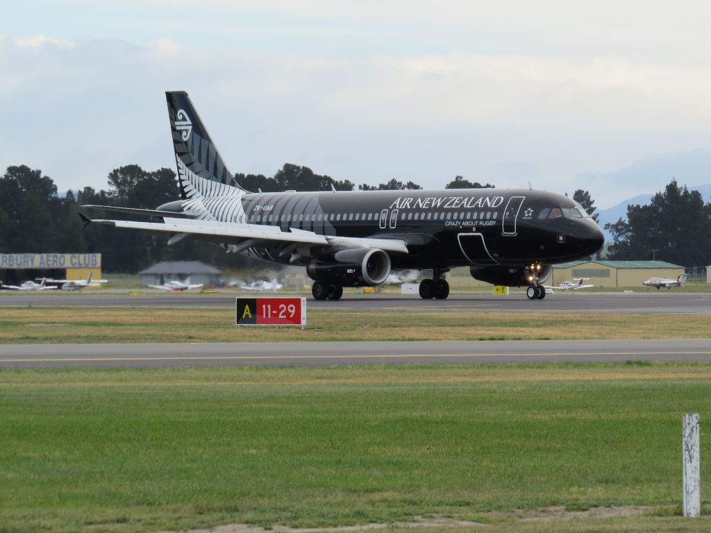 Airbus A320 (ZK-OAB) - ZK-OAB in its All Black livery arriving at Christchurch International (NZCH).