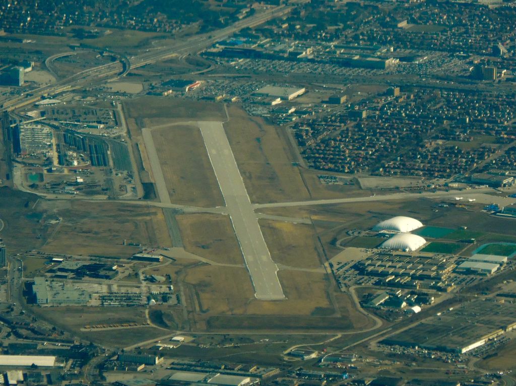 — — - Flying past Downsview Airport on our way to Toronto Pearson.