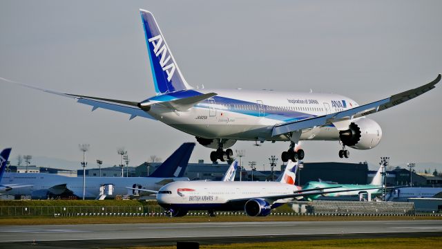 Boeing 787-8 (JA825A) - BOE516 on final to Rwy 16R to complete its maiden flight on 1/15/14. (LN:148 cn 34516).  BOE75 / G-STBI can be seen on the taxiway.