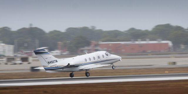 Beechcraft Beechjet (N492TM) - Private Plane Taking off on a foggy morning in Sarasota, Fl.