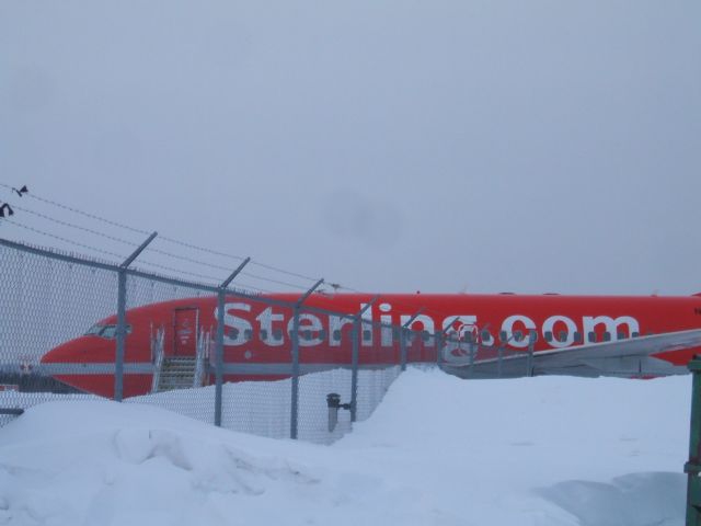 Boeing 737-700 (N280AG) - Parked at Irving Aviation FBO Goose Airport NL.. Jan22/09 Snow Bank to high and couldnt get near the fence for  a clear picture.