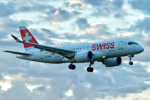 Bombardier CS100 (HB-JBE) - Bombbardier CS100 from Swiss Airlines , landing on Warsaw Airport , in capital city of Poland. 22.05.2018.