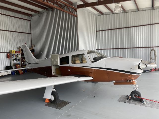 Piper Cherokee (N1118X) - 1118X looking pretty in the hangar. Scott Macdonald Aircraft.