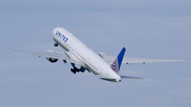 BOEING 777-300 (N2140U) - BOE760 on rotation from Rwy 34L for a second C1 flight on 5.9.17. (ln 1489 / cn 62651).