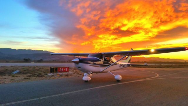 Cessna Skylane (N2114R) - Fiery sunset at KIZA