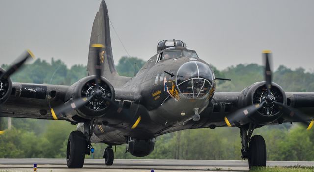 Boeing B-17 Flying Fortress (N3703G) - "The Movie Memphis Belle" taxiing in after giving its only ride of the day. After she shut down and got refueled, the rain and IFR set in for the rest of the day. 